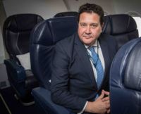 Paul Simmons, seen here in the airline's Business Class, was formerly with easyJet